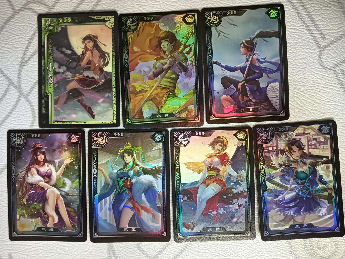 花开卡拍第40期（9月28号周日截拍，品控勿拍!!!拍品不寄存，运费5元，自制卡难免瑕疵，可能存在轻微撞角爆边等出厂瑕疵，品控介意勿拍！） 卡友自制三国女将 彩闪6张+光栅1张