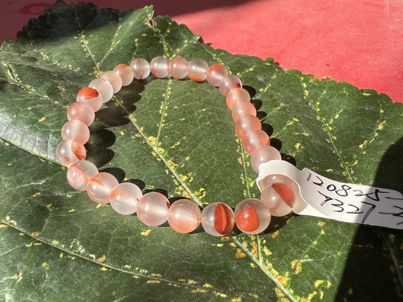 零元拍：清清爽爽粉粉嫩嫩的南红圆珠手串。约10克。6.5MM/27粒