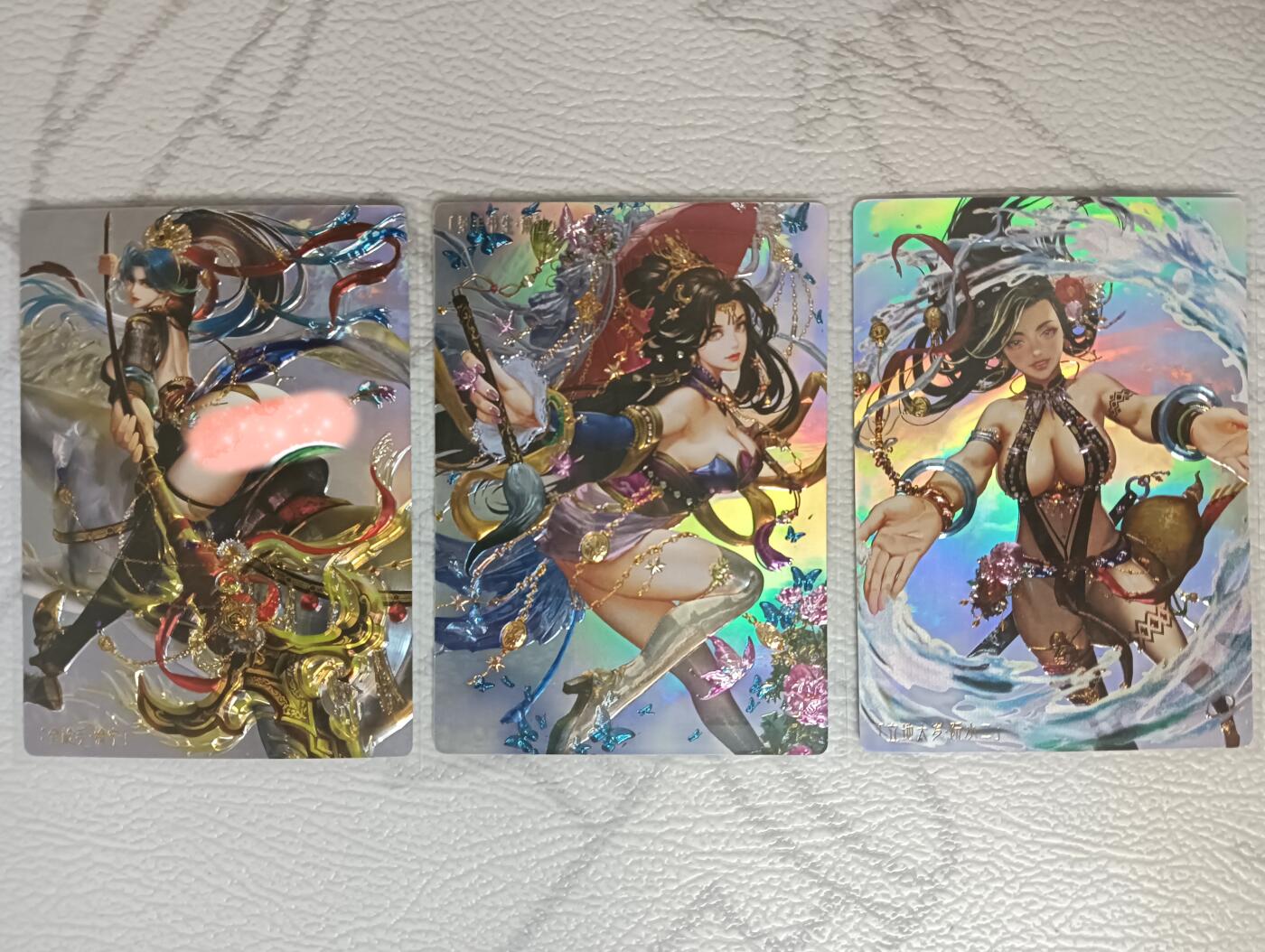 花开卡拍第40期（9月28号周日截拍，品控勿拍!!!拍品不寄存，运费5元，自制卡难免瑕疵，可能存在轻微撞角爆边等出厂瑕疵，品控介意勿拍！） 卡玩帕克水浒姬 全息镭雕 徐宁萧让阮小二 3张