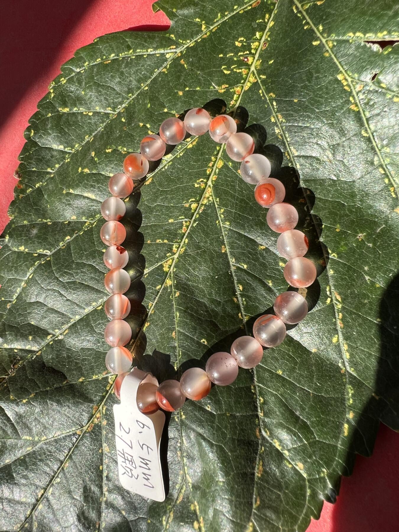 零元拍：清清爽爽粉粉嫩嫩的南红圆珠手串。约10克。6.5MM/27粒