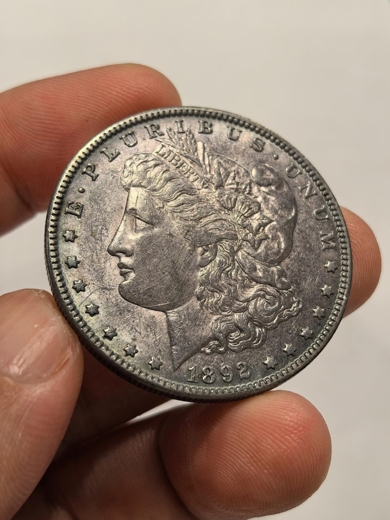 博洋堂世界钱币拍卖第142期（全场包邮） 美国1892年O版摩根银元 梦幻紫罗兰彩卷首币 UNC品相