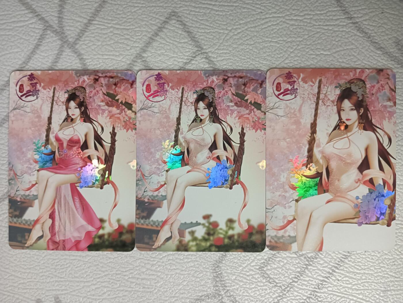 花开卡拍第40期（9月28号周日截拍，品控勿拍!!!拍品不寄存，运费5元，自制卡难免瑕疵，可能存在轻微撞角爆边等出厂瑕疵，品控介意勿拍！） 绘天阁红楼梦 秦可卿 彩闪三渐变 