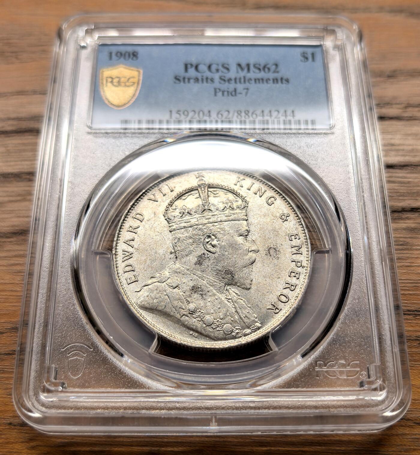 凡希社世界钱币微拍月度大拍（2025/09） 1908海峡殖民地爱七壹元PCGS-MS62，淡金彩，转光，实物状态一流。