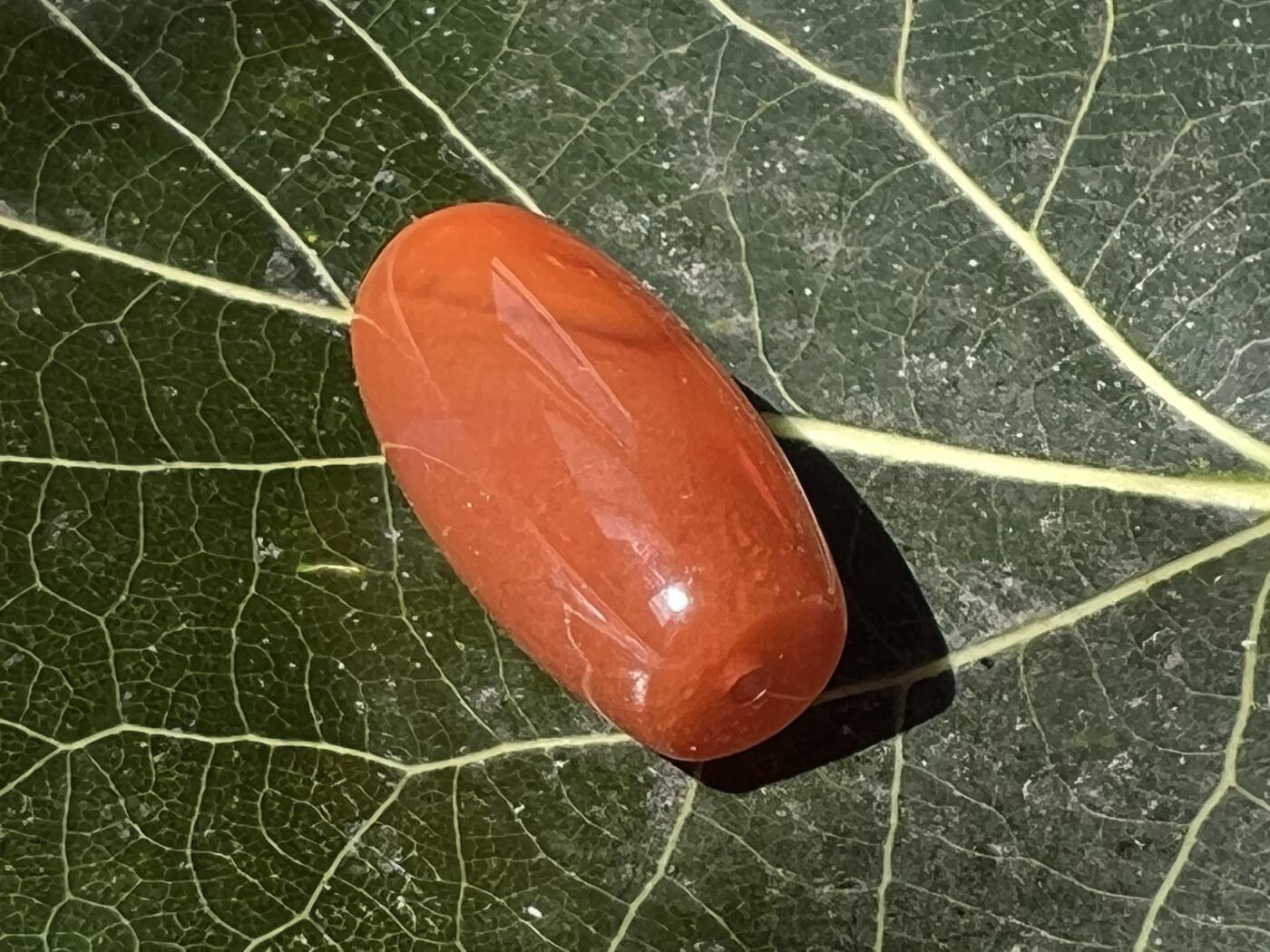 零元拍：南红玛瑙桶珠，约7.6克，26/13MM，颜色以实物为准。
