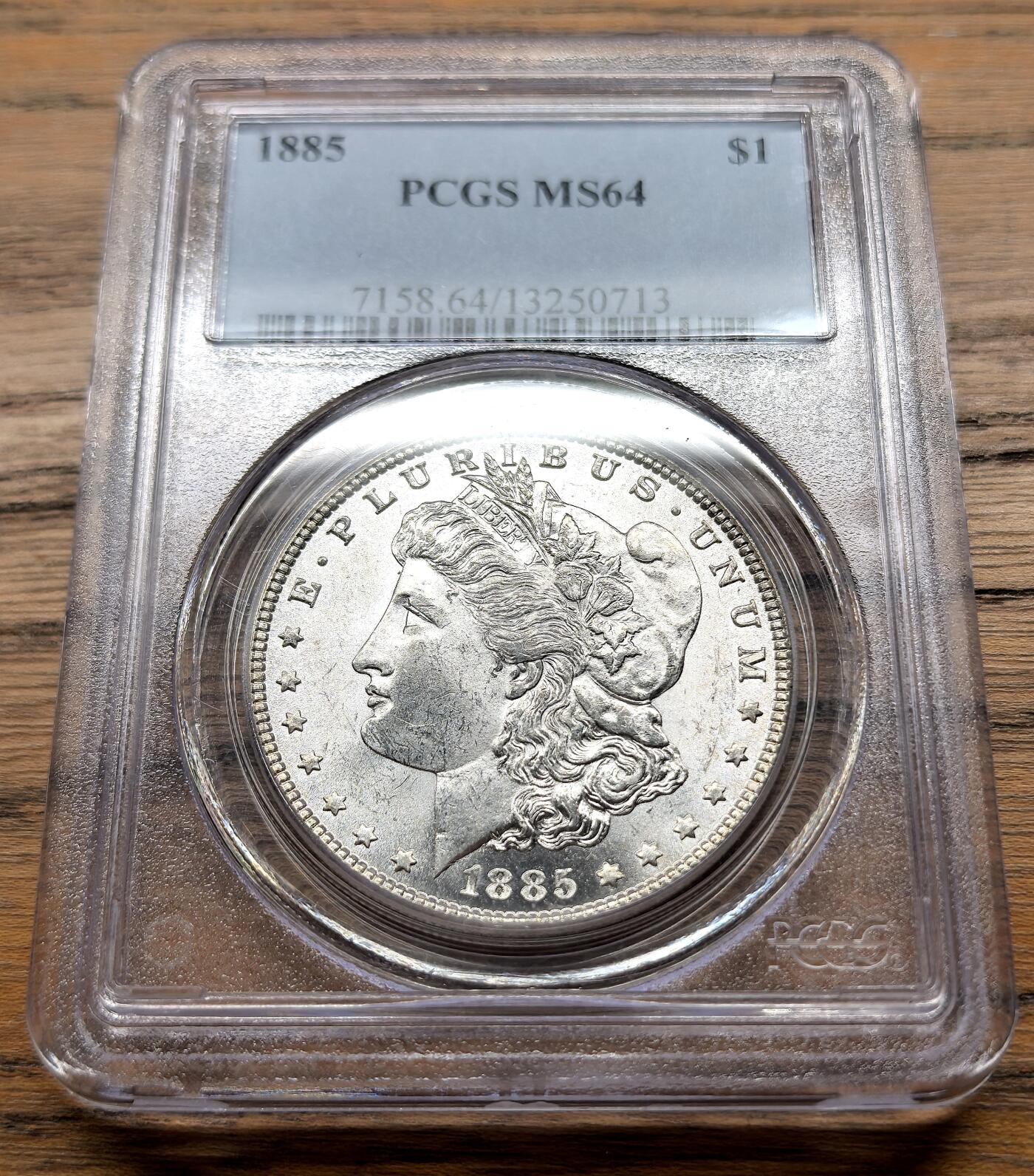 凡希社世界钱币微拍月度大拍（2025/09） 1885美国摩根壹元PCGS-MS64，原色银光品。