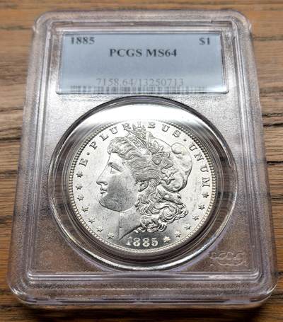 凡希社世界钱币微拍月度大拍（2025/09） - 1885美国摩根壹元PCGS-MS64，原色银光品。