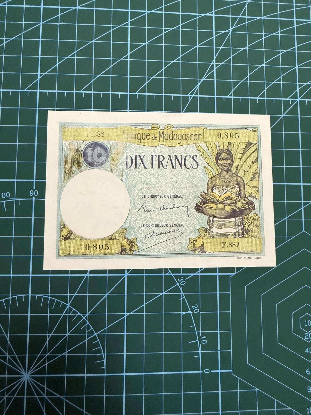 【炜奕收藏】，第四十六期 1937年马达加斯加10法郎，AU品相，处理票