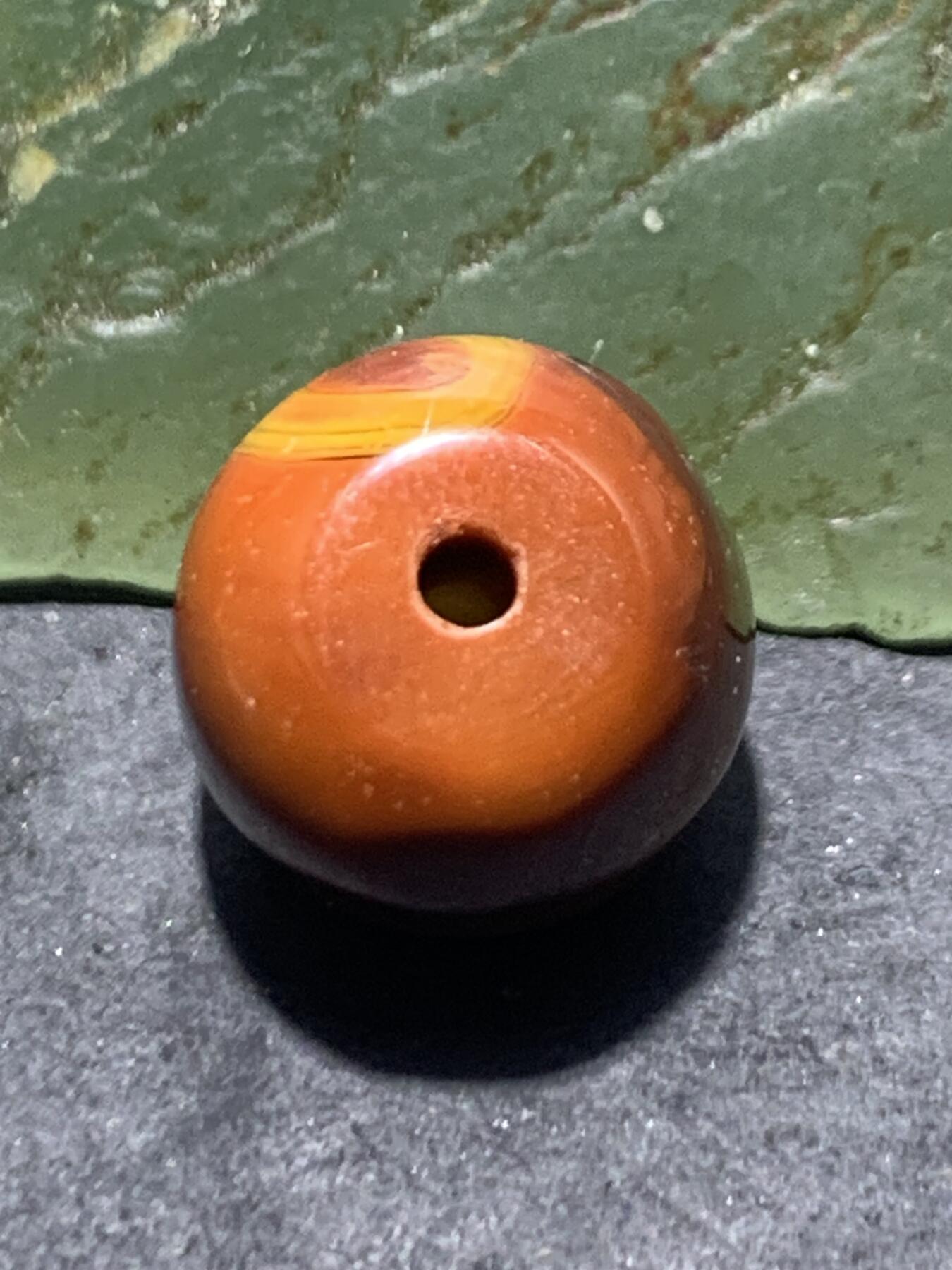 冻料战国红玛瑙老形通货桶珠一个，