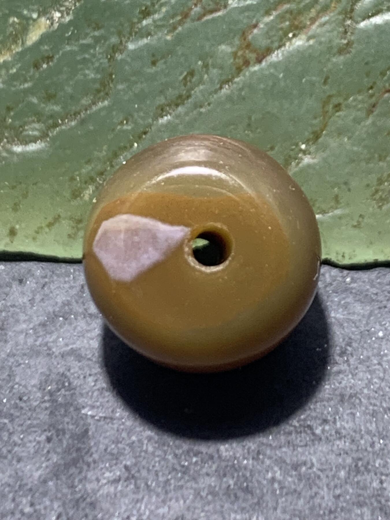 冻料战国红玛瑙老形通货桶珠一个，