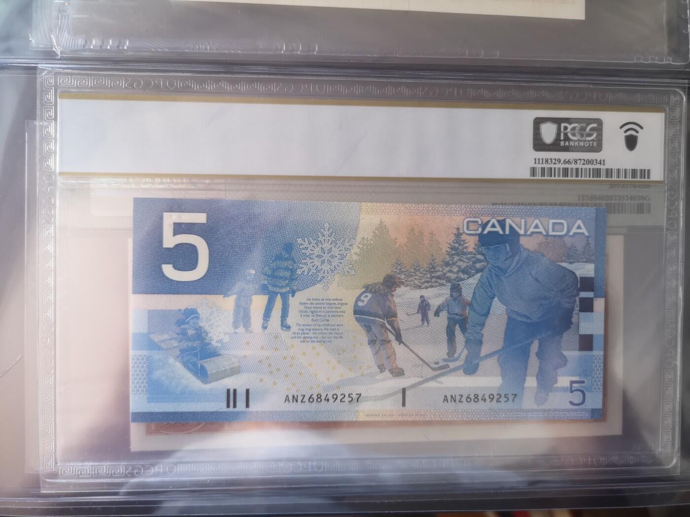 长老汇蛇年精选第五十三场拍卖 2002加拿大5元，PCGS66，串号：ANZ6849257