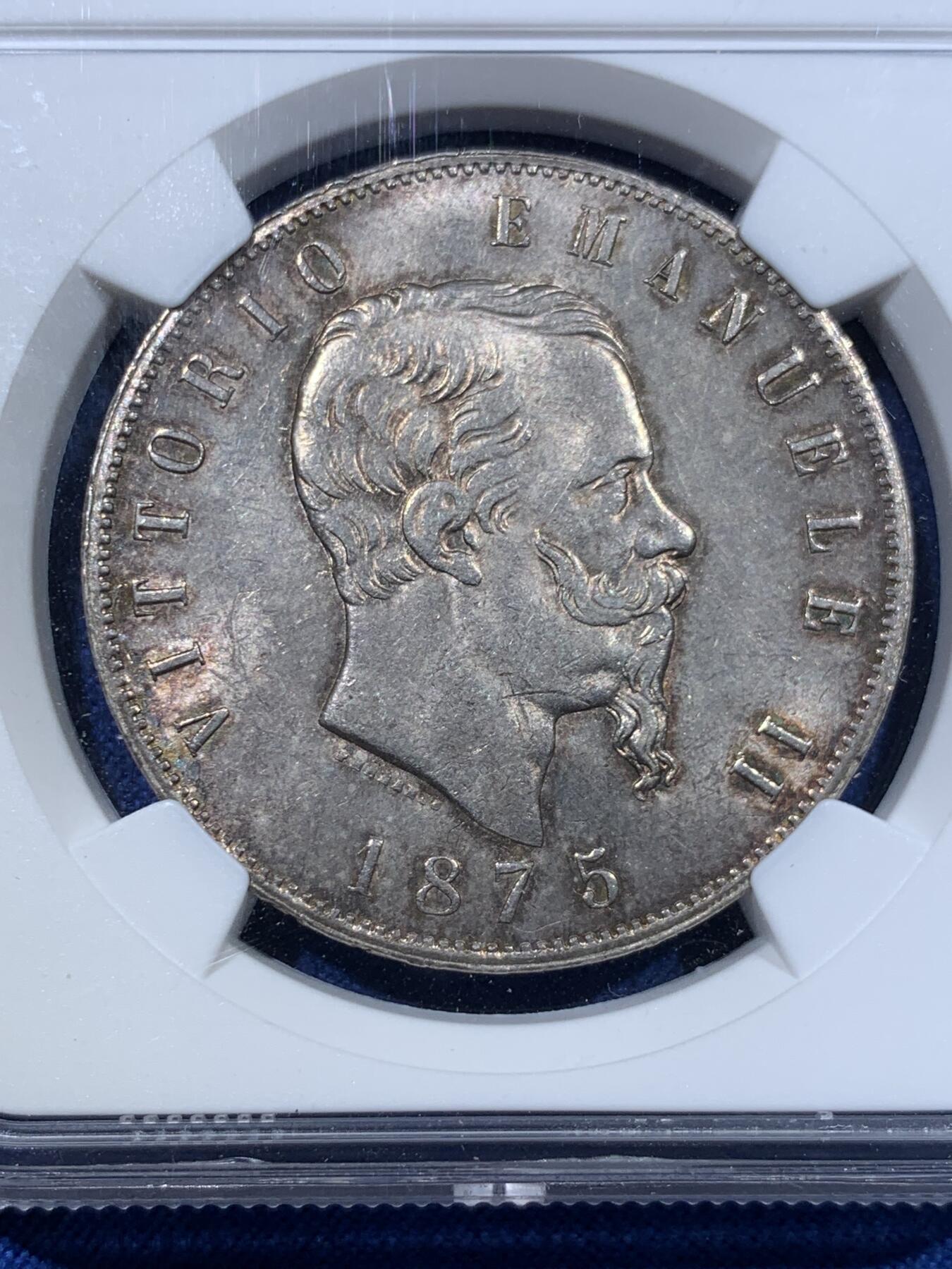 《竞宝斋》第423场 周日，周一，周二  3场连拍 （全场包邮） NGC MS63 意大利1875M流通5里拉大银币，埃曼努尔二世，米兰厂。淡金彩浆，转光流畅，更高分仅4枚，意系流通主币中难得比较低估的品种。同年64+麦稀奇5201元不含佣成交