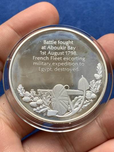 《竞宝斋》第423场 周日，周一，周二  3场连拍 （全场包邮） 蒙巴顿大英海洋史精制银章，37.5克，925银，比马剑大一圈，侧银标。1798尼罗河战役全歼拿破仑海军，海权霸主地位初立。此套银章铭刻了大英王霸世界海权的每次关键，宏大史诗，设计华美，收藏价值极高。