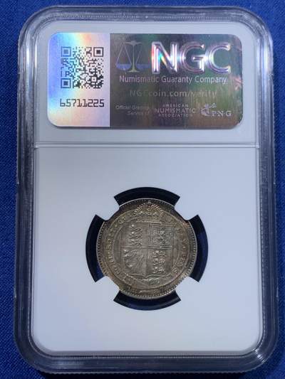 《竞宝斋》第423场 周日，周一，周二  3场连拍 （全场包邮） NGC MS63 英国1887年 维多利亚女王1先令银币，欧洲老藏家百年收藏，长期储存形成的欧洲五彩包浆，双面色泽皆美丽动人，63分里的极品，姹紫嫣红。