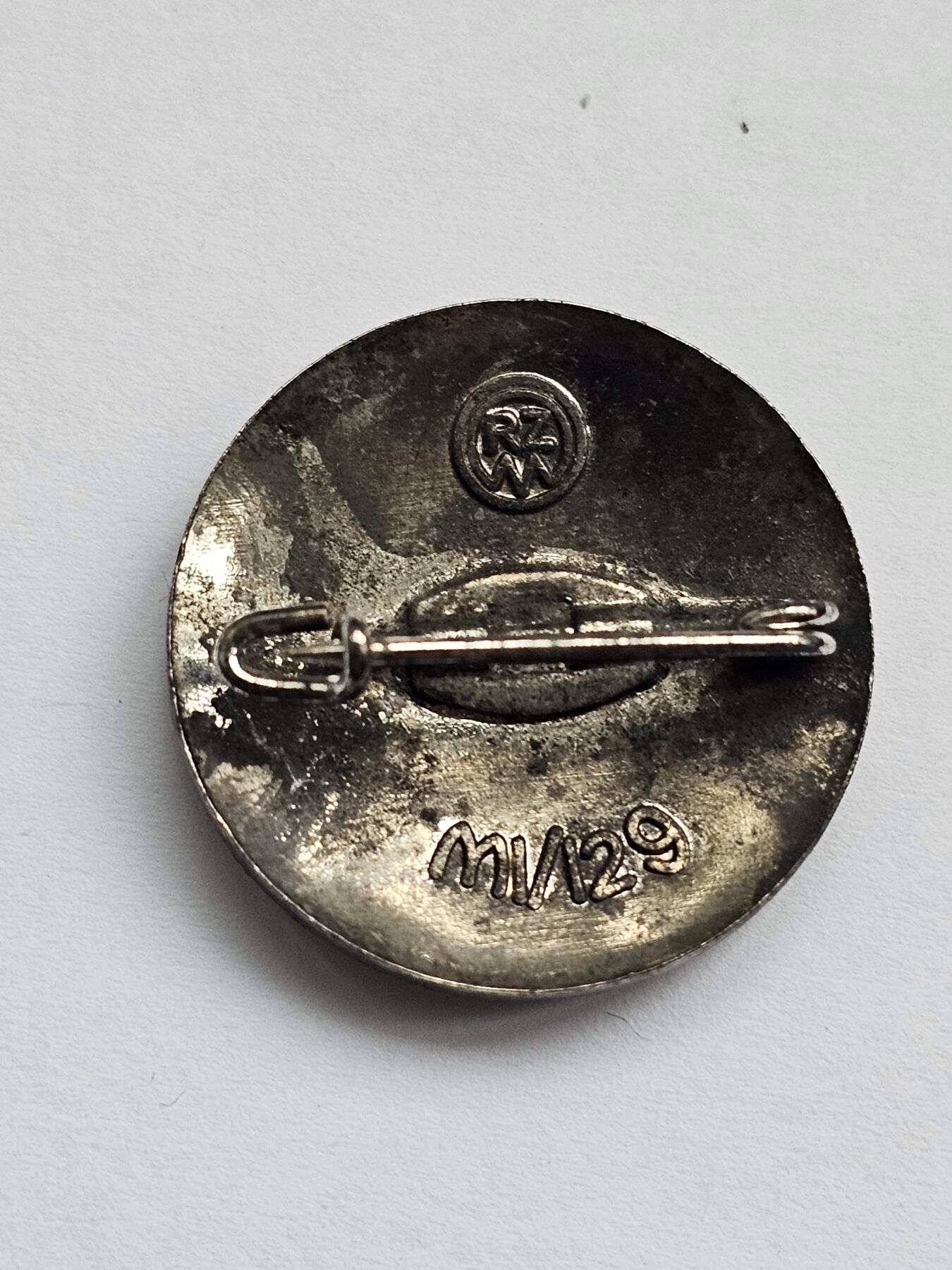 WWll德国nsdap成员徽章 带rzm标m1/129厂制造
