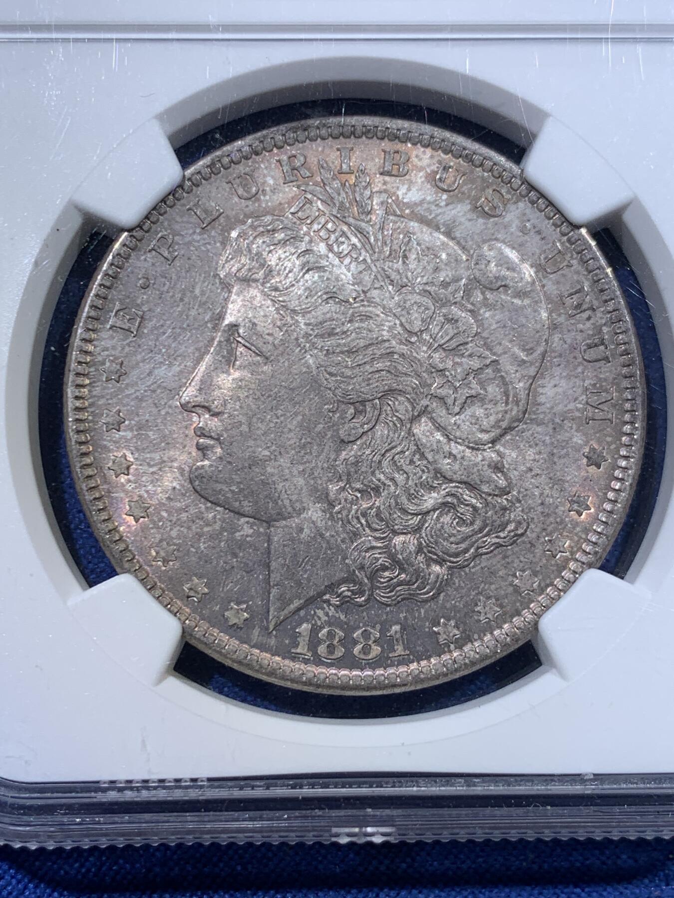 《竞宝斋》第423场 周日，周一，周二  3场连拍 （全场包邮） NGC MS64 美国1881年摩根大银币，卷首香槟包浆。