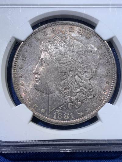 《竞宝斋》第423场 周日，周一，周二  3场连拍 （全场包邮） NGC MS64 美国1881年摩根大银币，卷首香槟包浆。