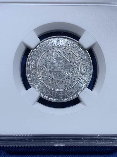 《竞宝斋》第423场 周日，周一，周二  3场连拍 （全场包邮） NGC MS66 摩洛哥1950年5法郎 少见高分 两面转光 图案富有阿拉伯国家风情 一步到位的品相