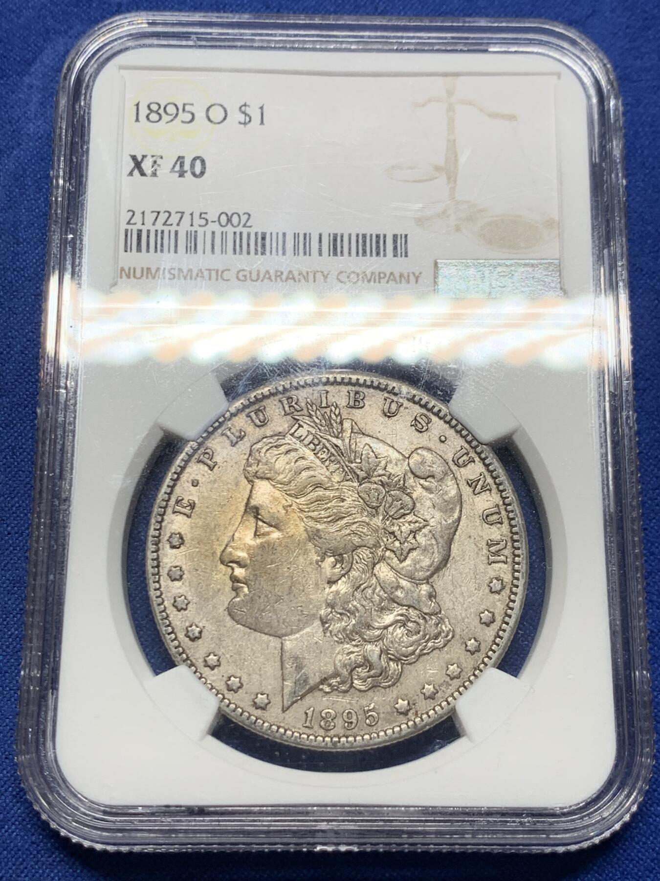 《竞宝斋》第423场 周日，周一，周二  3场连拍 （全场包邮） NGC XF40 美国 1895年 一美元 摩根银币 “摩根王”年份 整体味道和状态不错 砸盒重评有望加分