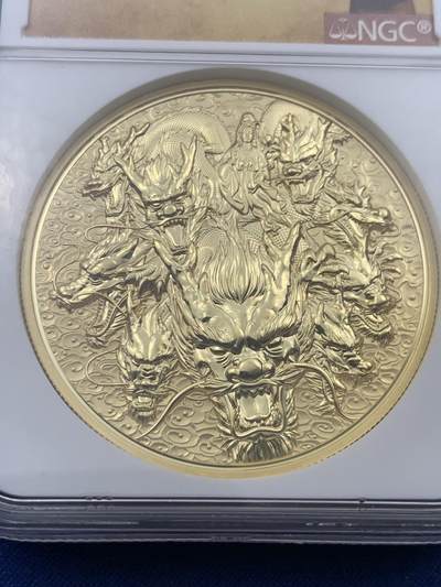 《竞宝斋》第423场 周日，周一，周二  3场连拍 （全场包邮） NGC PF70UC 2022年九龙观音镀金铜章，佛祖标签。骑龙观音又称龙头观音（辟支佛身）是观音菩萨三十三应化身之一。背面刻有般若波罗蜜多心经 ，45mm，加厚盒，满分好品。