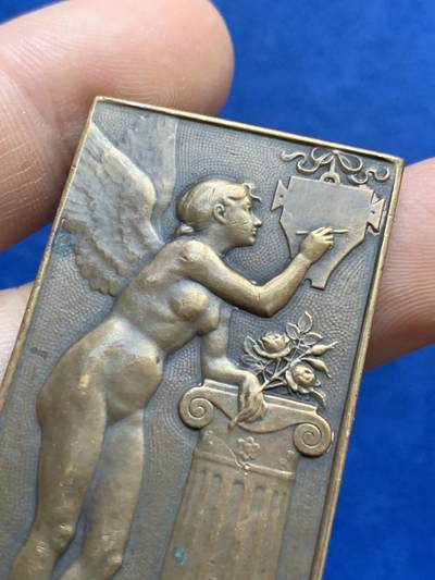 《竞宝斋》第424场 周日，周一，周二  3场连拍 （全场包邮） 名家E. MOUCHON 1907年作《天使》铜章 30.95克 29*53mm 丰饶角铜标