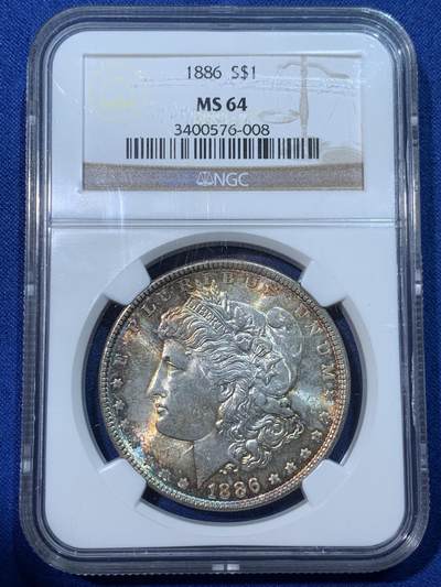 《竞宝斋》第424场 周日，周一，周二  3场连拍 （全场包邮） - NGC MS64 美国1886年摩根1元大银币 淡金色包浆环彩 倒影包浆非常诱人