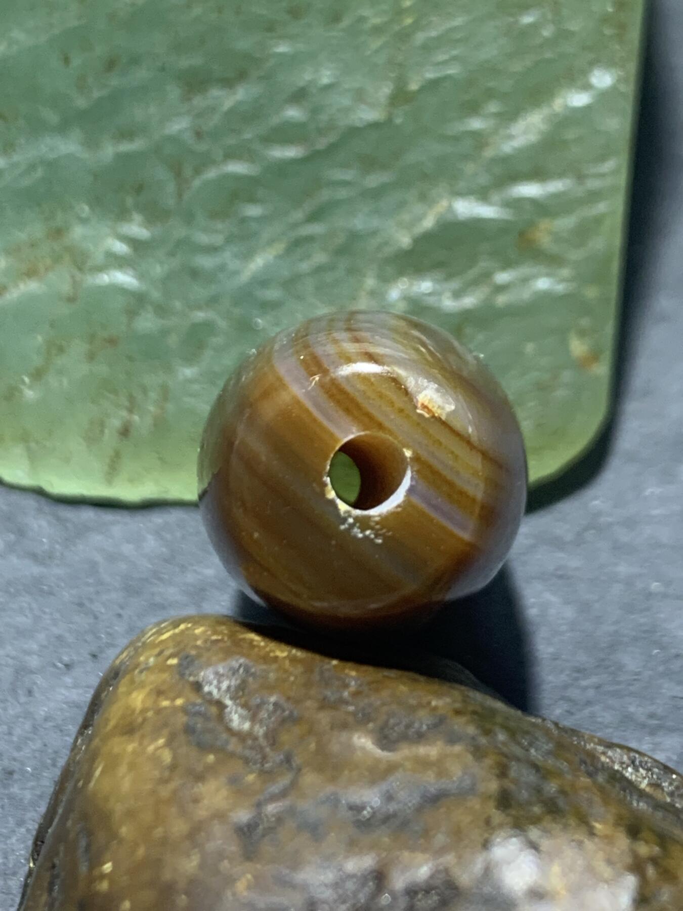 高玉化天眼缠丝玛瑙通货随形桶珠一颗