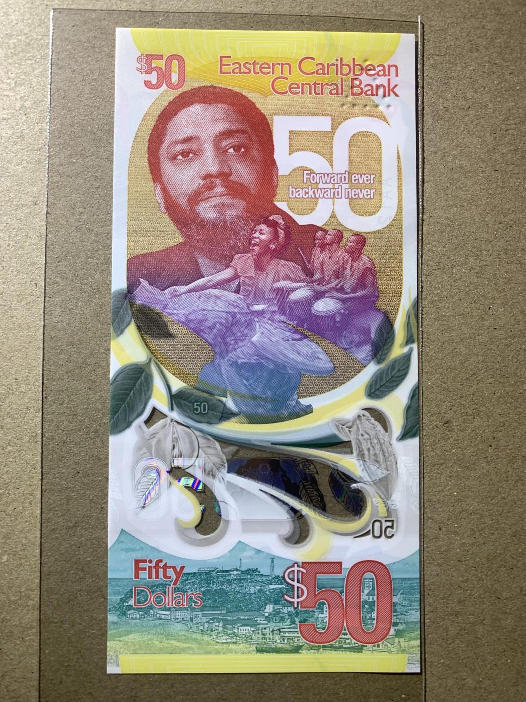 【礼羽收藏】🌏世界钱币拍卖第130期 【AA122288】2024年东加勒比50元塑料纪念钞 AA首发冠 无3457尾88 发发号 朦胧号 PMG67分 高分靓号 值得拥有