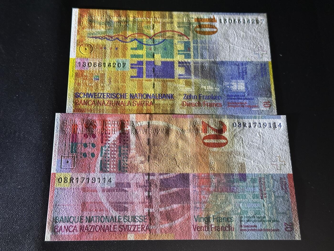 《外钞收藏家》第五百七十二期（畅拍场）（本平台长期征集拍品、欢迎藏友们联系合作） 瑞士人像竖版10和20法郎 两张一起 全新UNC