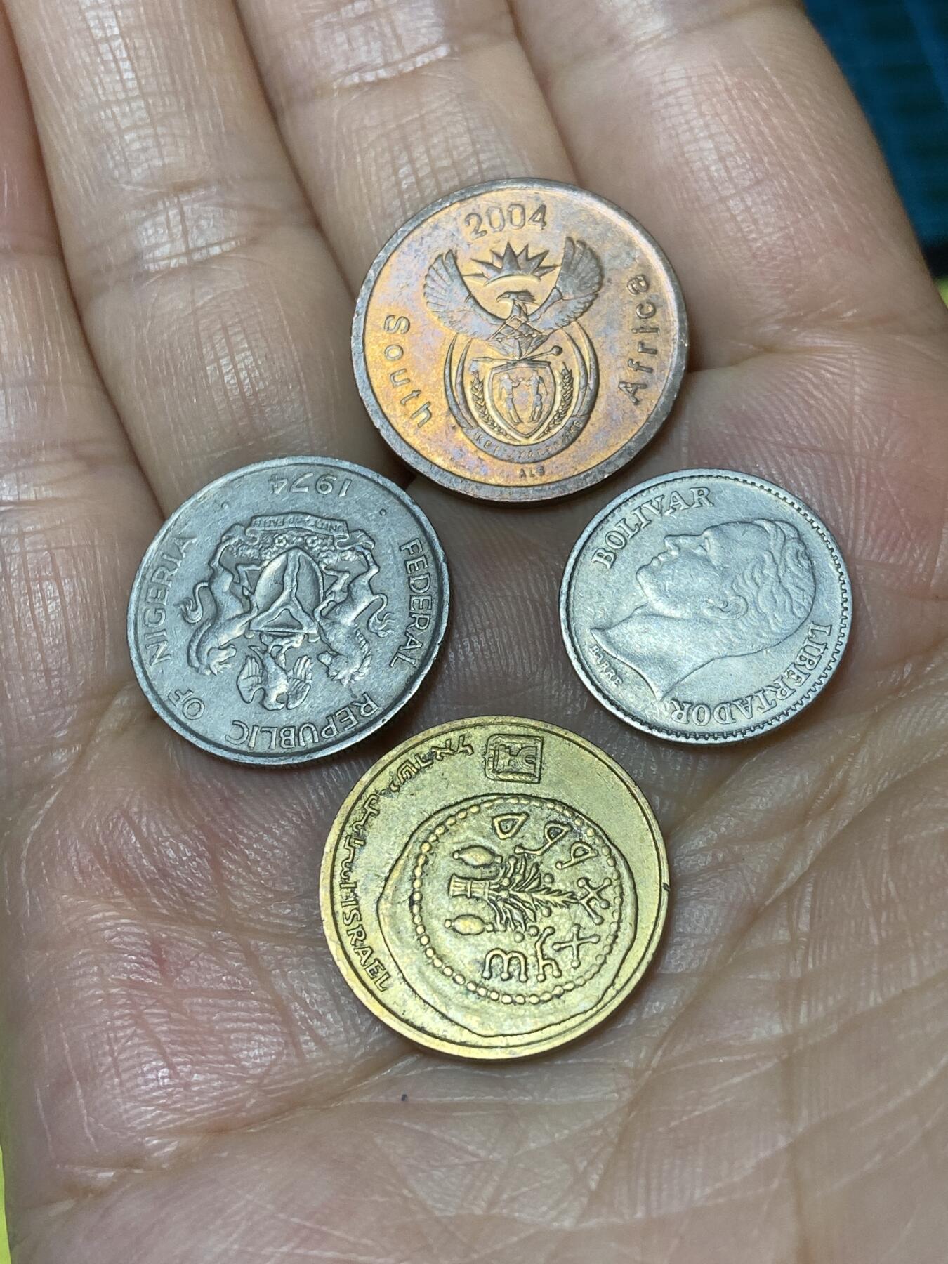 2025年第一百零一场(总第一百二十七场）外国好品散币(免佣金) 散币4枚：南非🇿🇦2004年5分，委内瑞拉🇻🇪1977年25分，尼日利亚🇳🇬1974年5考包，以色列🇮🇱5阿高洛