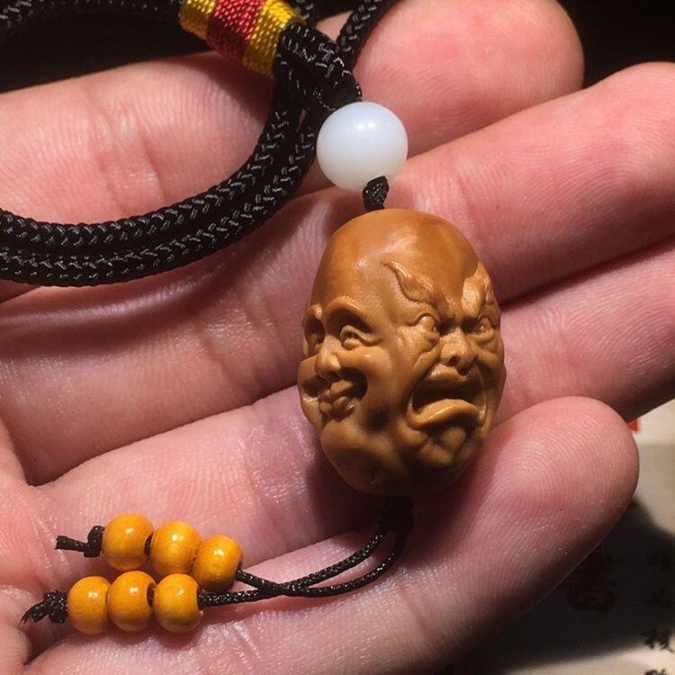 文玩橄榄核喜怒哀乐单籽