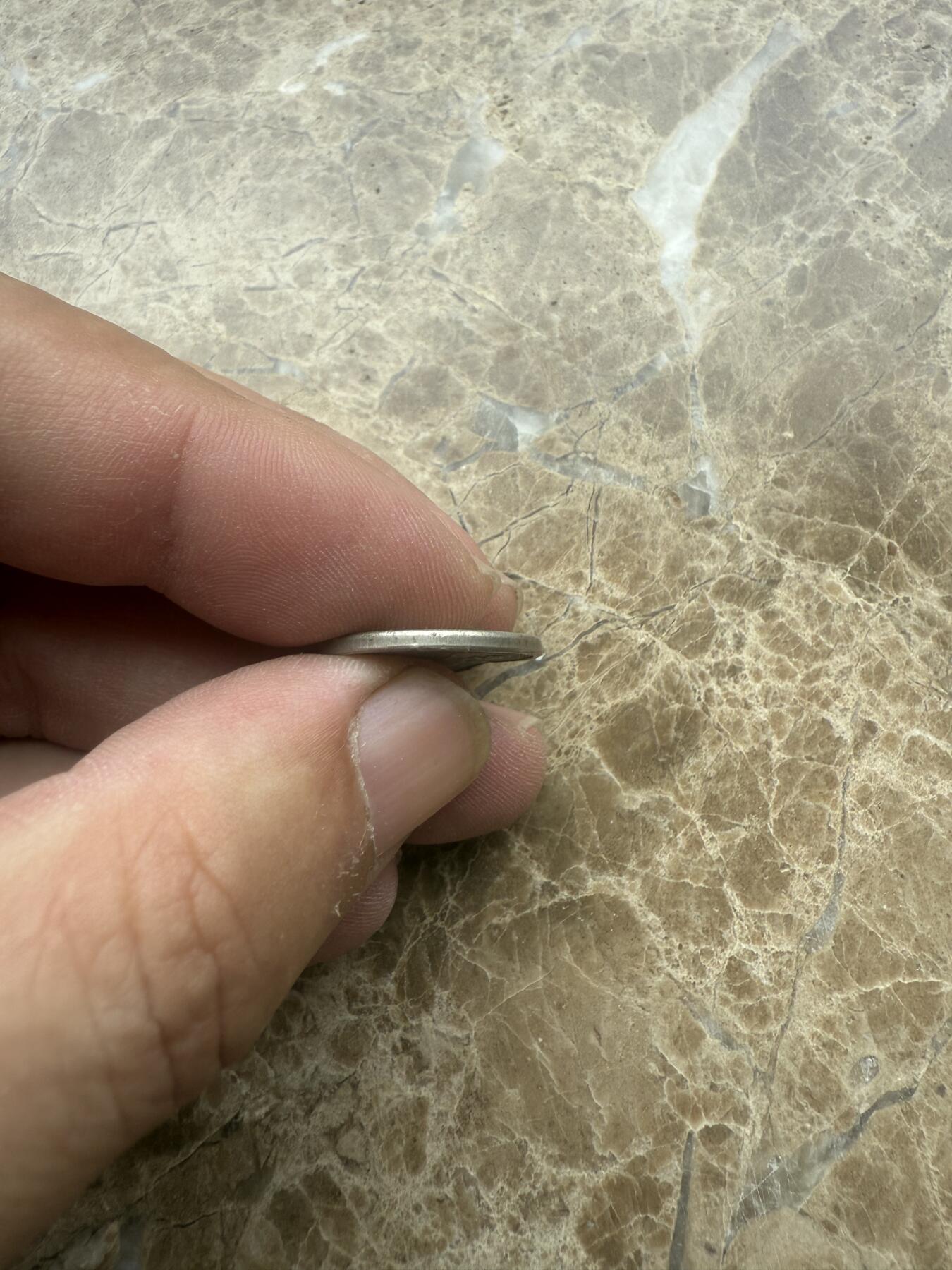 四海杂货铺试营业 伪华兴拾分镍币
