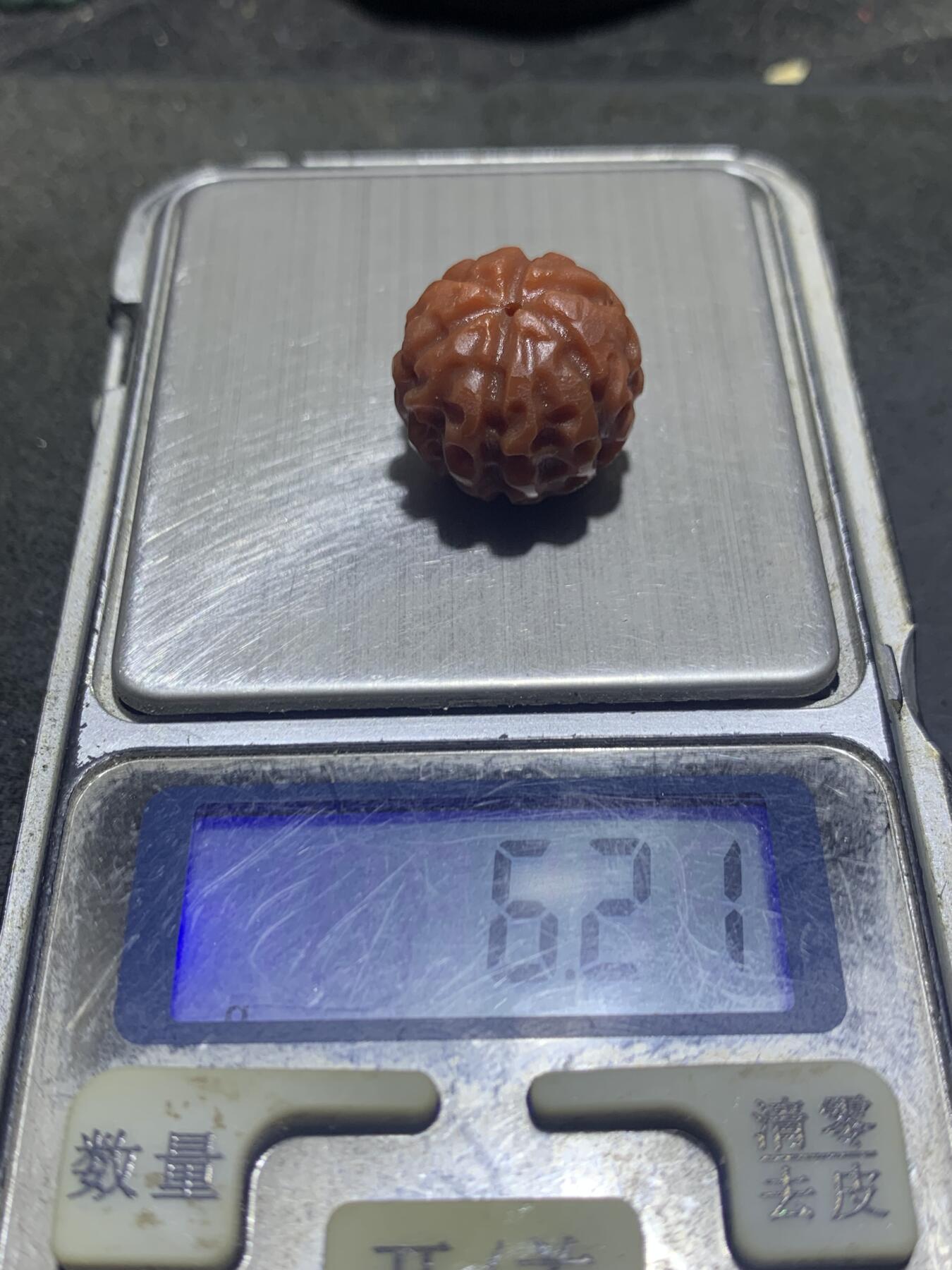 精美亚光柿子红南红玛瑙雕刻金刚一颗！