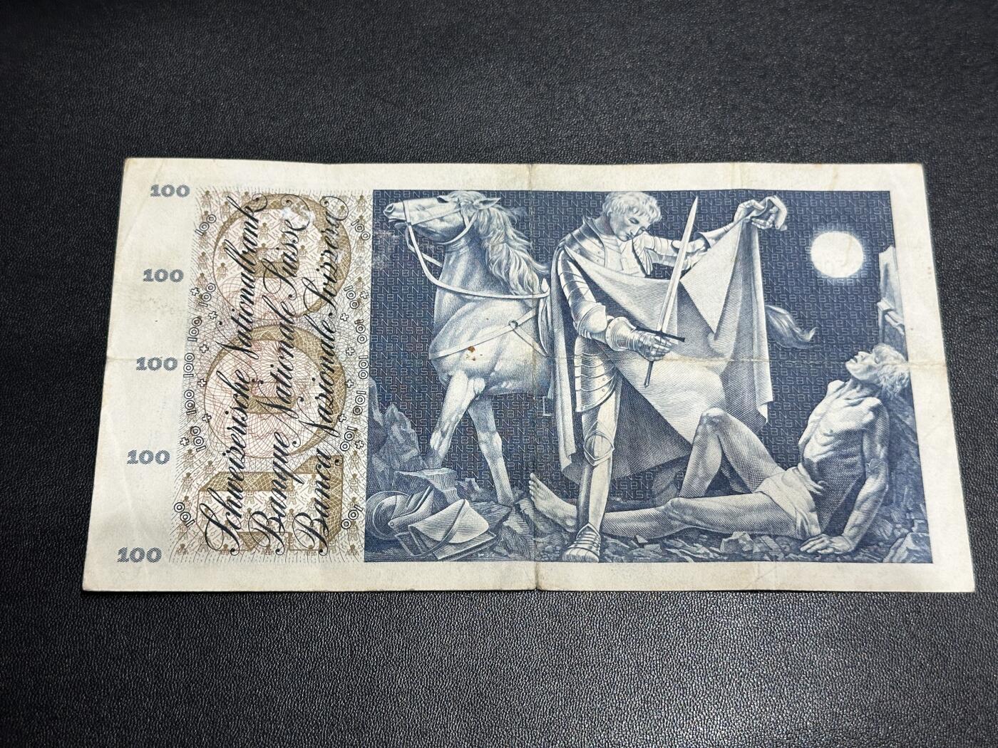 《外钞收藏家》第五百七十三期（精品场）（本平台长期征集拍品、欢迎藏友们联系合作） 1964年瑞士100法郎 割袍 非全新 品相如图