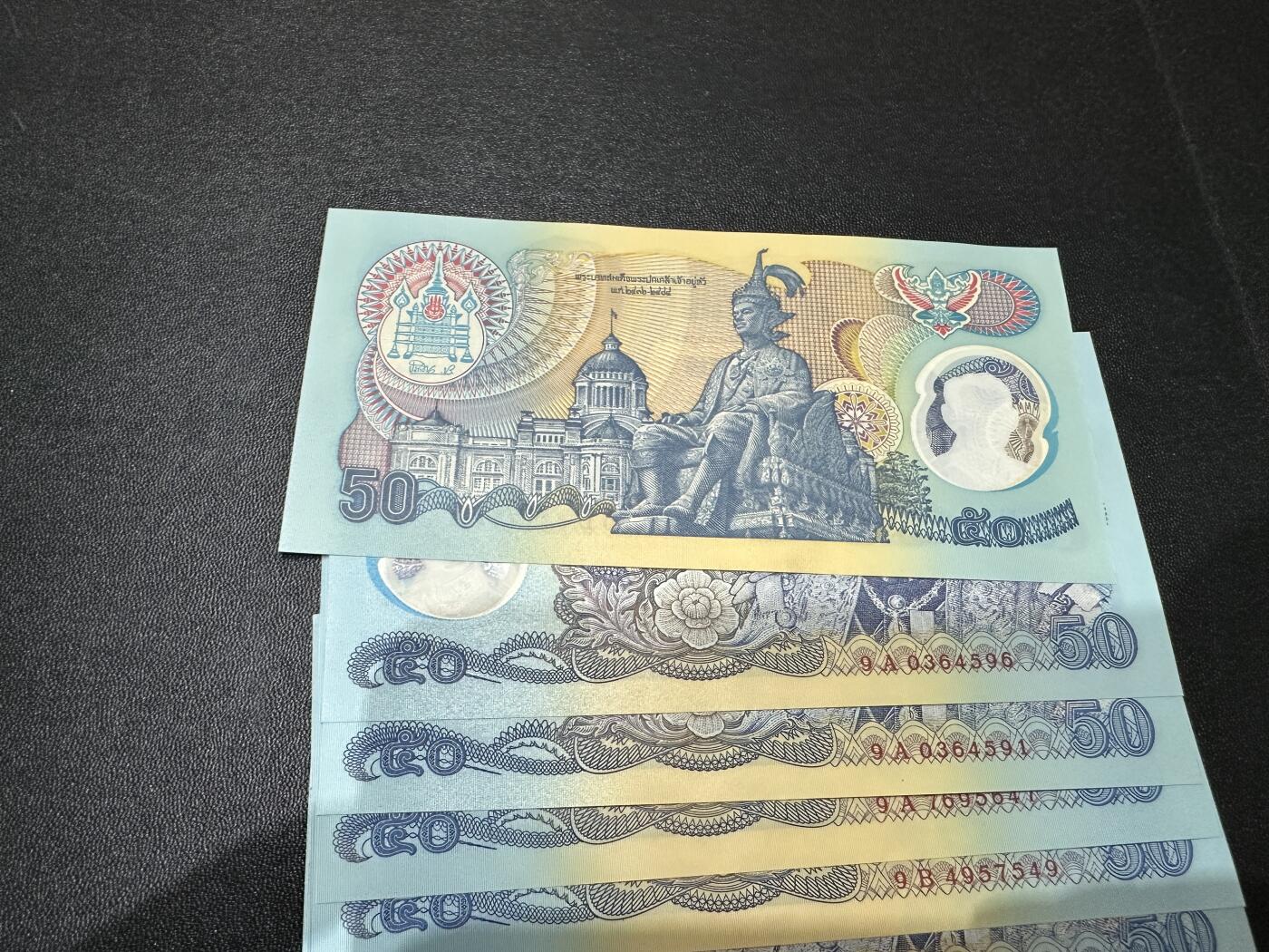 《外钞收藏家》第五百七十三期（精品场）（本平台长期征集拍品、欢迎藏友们联系合作） 泰国1996年50泰铢国王塑料纪念钞10张一起	UNC