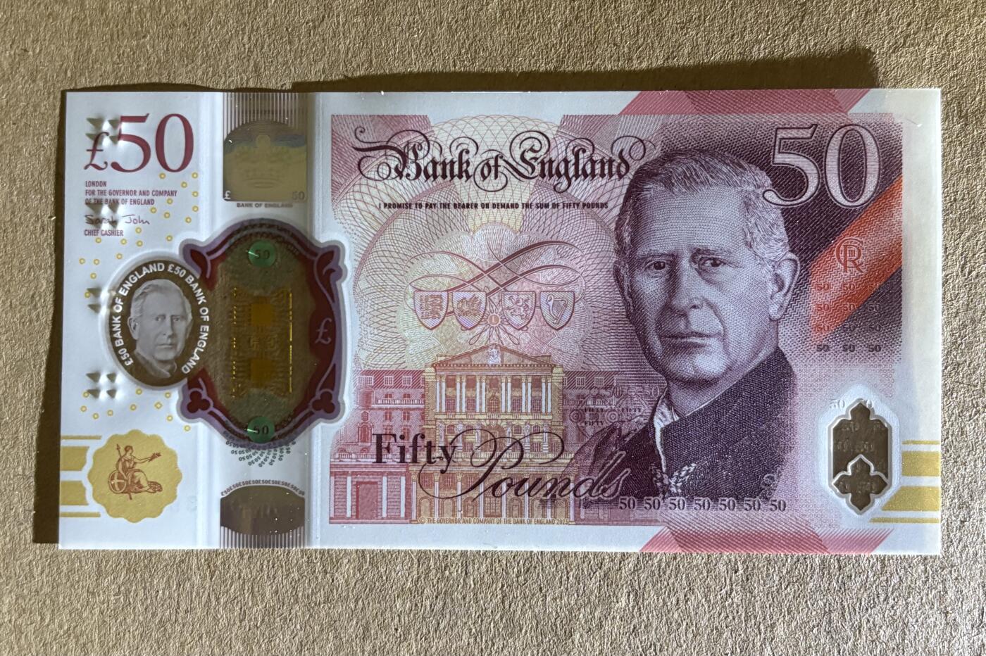 【丑猫1012】周日晚6点半 英国查50unc(首发AJ01352686)
