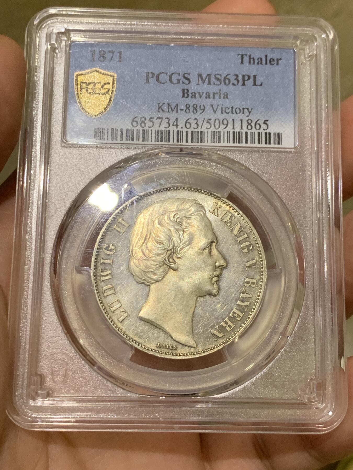 《竞宝斋》第425场 周日，周一  2场连拍 （全场包邮） PCGS MS63PL 德国1871年巴伐利亚路德维希二世普法战争胜利泰勒 PL底板 非常难得的胜利泰勒 目前任何品种的PL泰勒都是受追捧对象 PC亚军分 更高分仅一枚