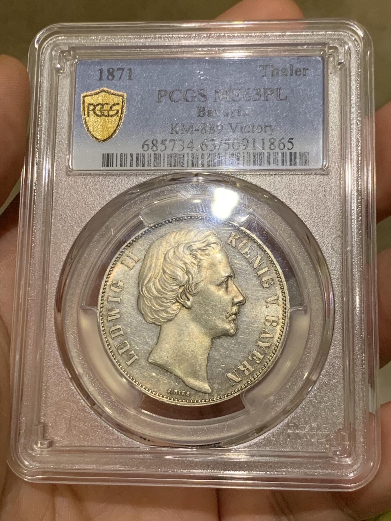 《竞宝斋》第425场 周日，周一  2场连拍 （全场包邮） PCGS MS63PL 德国1871年巴伐利亚路德维希二世普法战争胜利泰勒 PL底板 非常难得的胜利泰勒 目前任何品种的PL泰勒都是受追捧对象 PC亚军分 更高分仅一枚
