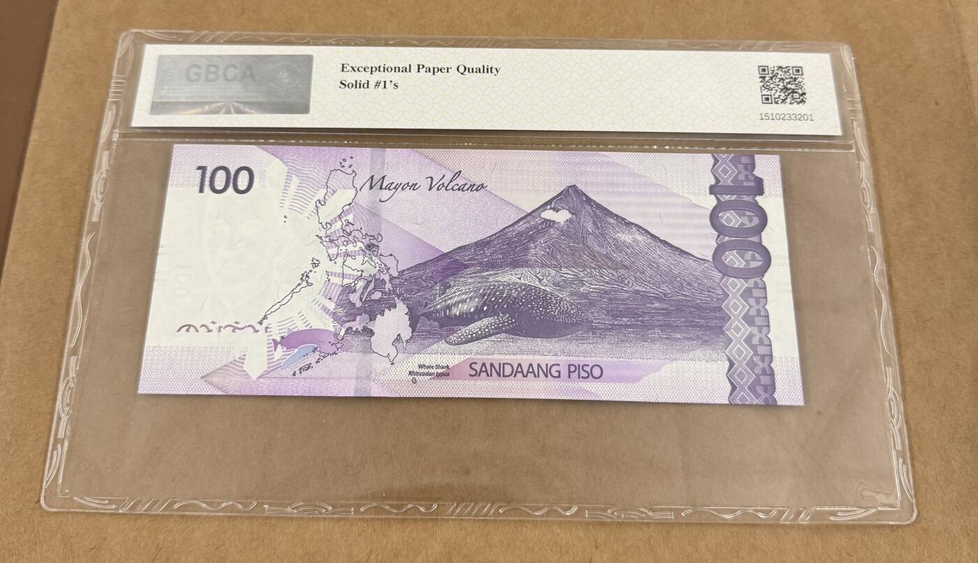 《外钞收藏家》第五百七十三期（精品场）（本平台长期征集拍品、欢迎藏友们联系合作） 菲律宾100元 全同1 公博评级68分