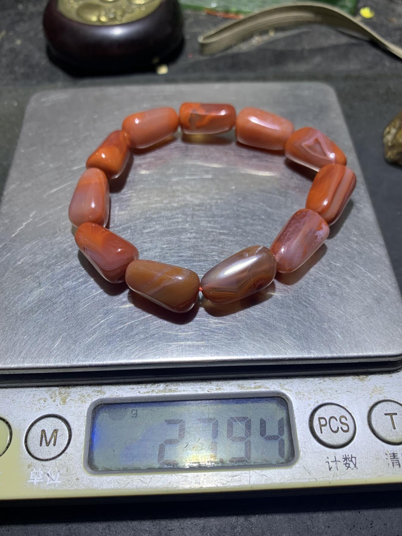 川料红白南红玛瑙随形单圈手串一条，