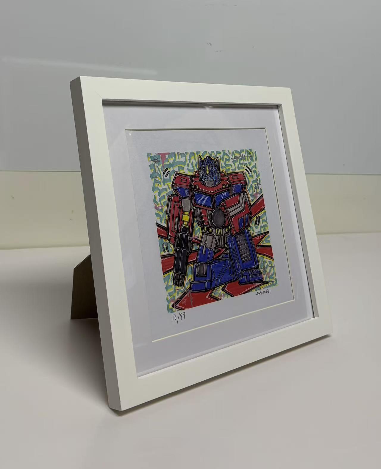 零元拍：歪歪亲笔签名 OWSON 系列作品装饰画《变形金刚》，已做装裱 木框相框尺寸28/28CM。因展品出展，镜框或亚克力可能有轻微划痕，介意勿拍