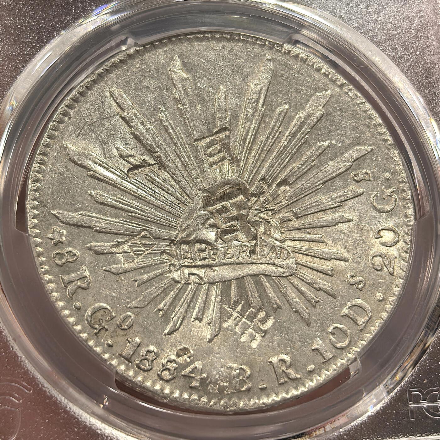 博洋堂世界钱币拍卖第142期（全场包邮） PCGS AU 墨西哥1884年GO BR版花边鹰洋，原光十足，多个精美戳记