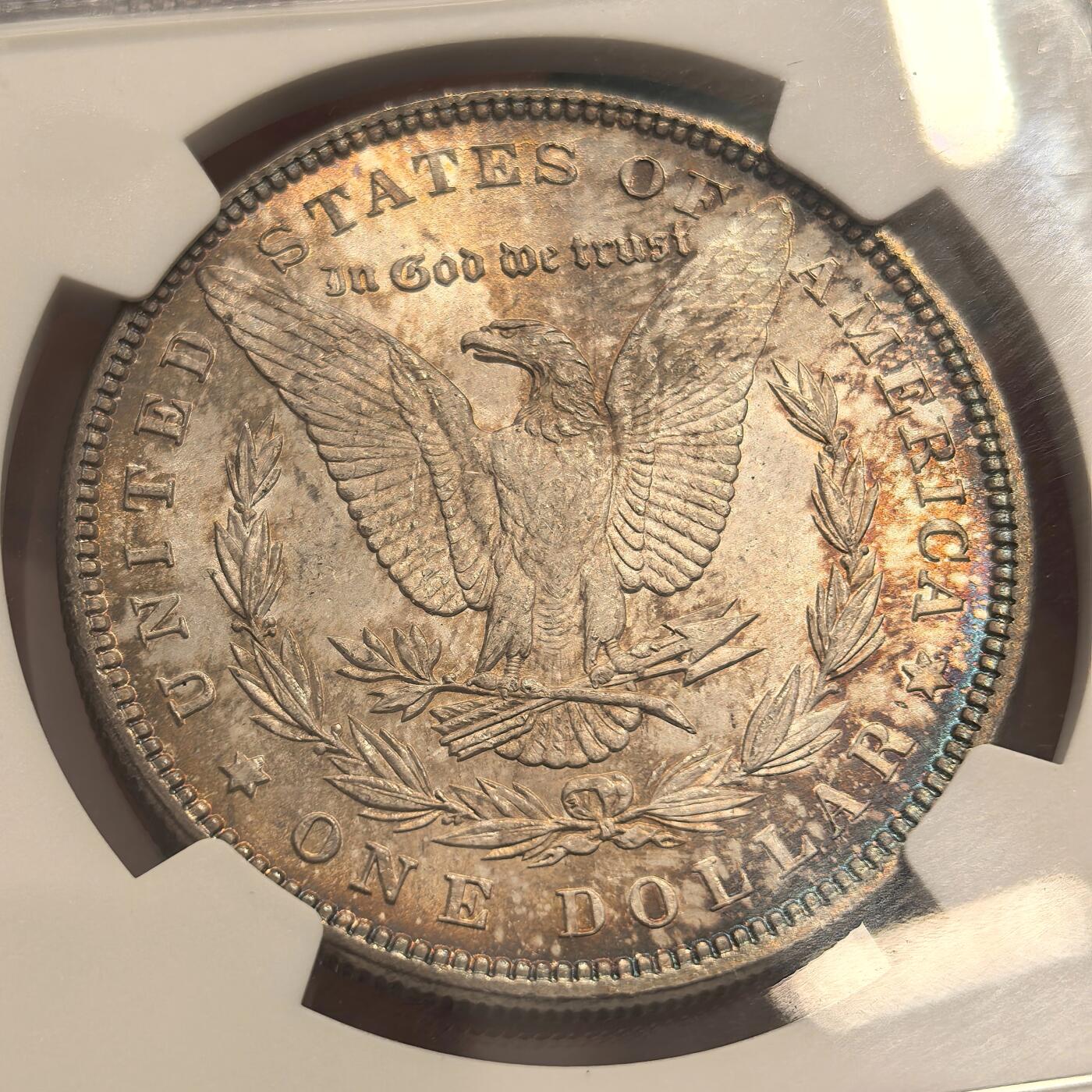 博洋堂世界钱币拍卖第142期（全场包邮） NGC MS64 美国1885年摩根银币P厂 女神面蓝紫满彩+蓝环彩 背面底光很好 漂亮的蓝月牙彩