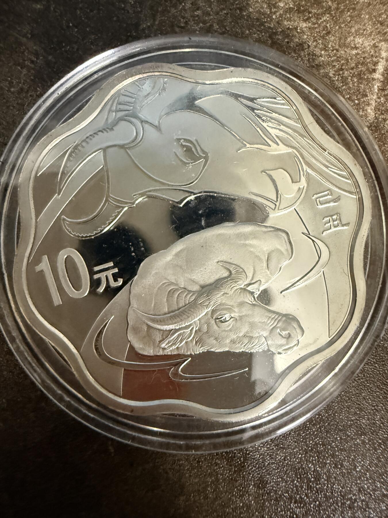 2009年己丑牛纪念币（梅花型）一盎司银