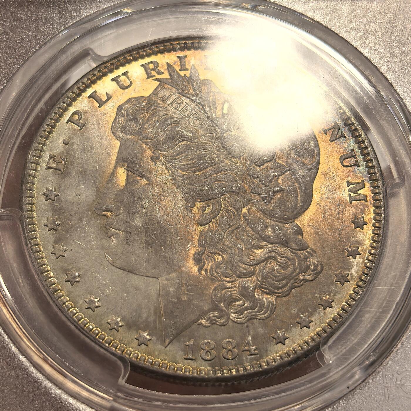 博洋堂世界钱币拍卖第142期（全场包邮） PCGS MS66 美国1884摩根 高分老包浆 背面下方卡槽有一小磕