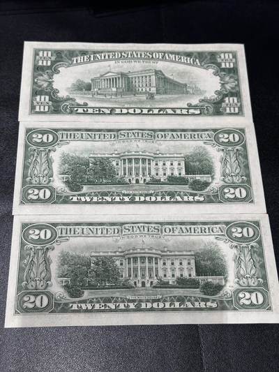 《外钞收藏家》第五百七十四期（精选场）（本平台长期征集拍品、欢迎藏友们联系合作） 美国小头版10和20美元 UNC- 边角轻微潮等瑕疵