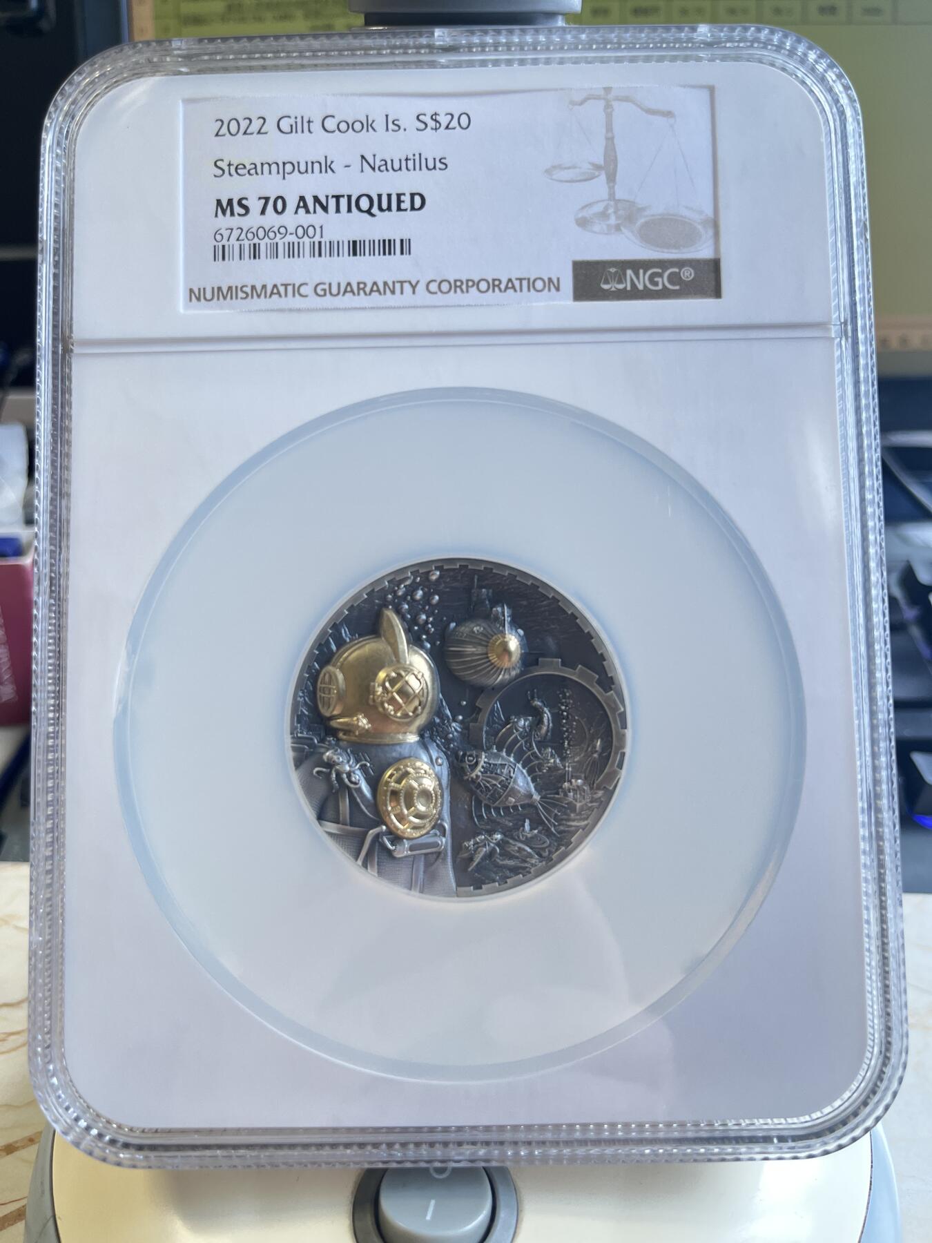 第177期拍卖【长期征集拍品】 NGC-PF70ULTRA CAMEO 库克2022年发行蒸汽朋克系列-鹦鹉螺浮雕镀金仿古纪念银币（超高浮雕效果震撼，3盎司克重，币径50MM，限量发行888枚，加厚大盒，拥有上天下海的能力一直是人类挑战未知世界的渴望，这枚里面寓意着人类挑战海洋成功！），无盒无证书