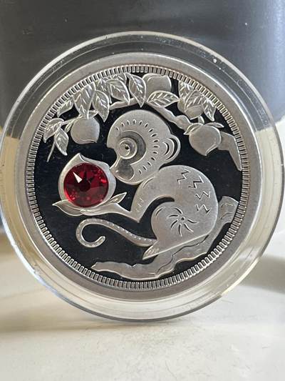 第177期拍卖【长期征集拍品】 - 托克劳2016年蟠桃会镶嵌红水晶1/3盎司纪念银币，999银