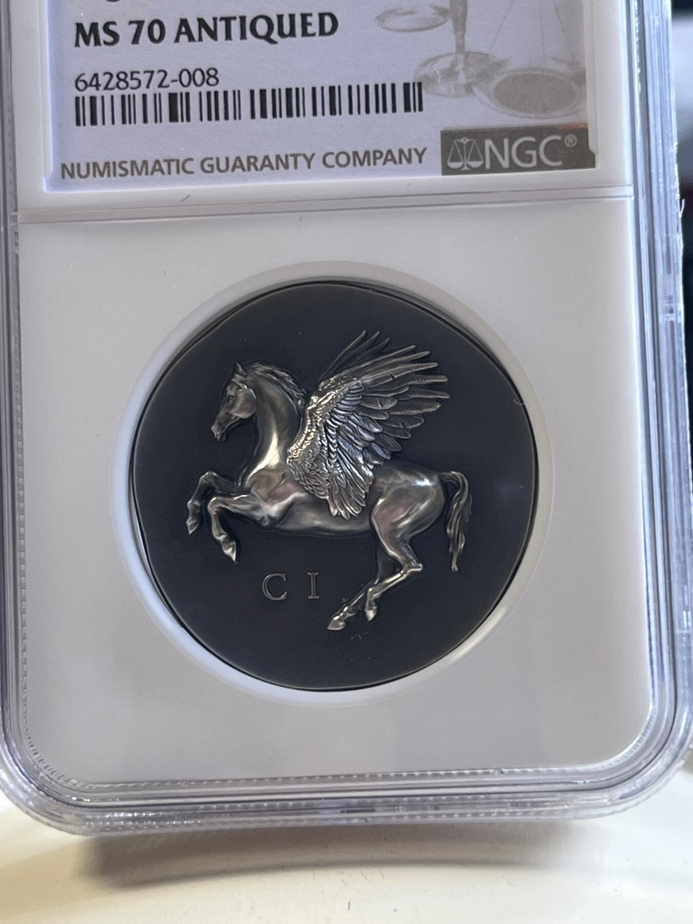 第177期拍卖【长期征集拍品】 NGC-MS70 ANTIQUED 库克2022年发行古希腊货币3（超高浮雕飞马设计）仿古银币（CIT重现千年历史货币复刻：1盎司克重，999纯银，33MM，限量999枚，盒证齐全）