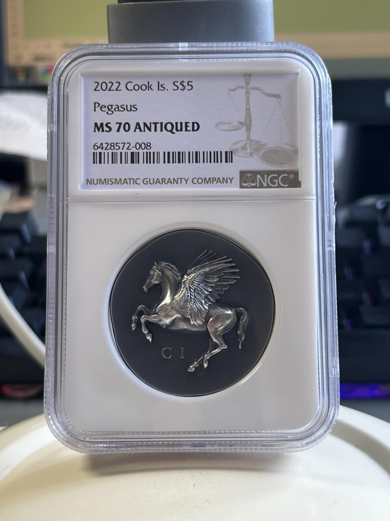 第177期拍卖【长期征集拍品】 NGC-MS70 ANTIQUED 库克2022年发行古希腊货币3（超高浮雕飞马设计）仿古银币（CIT重现千年历史货币复刻：1盎司克重，999纯银，33MM，限量999枚，盒证齐全）