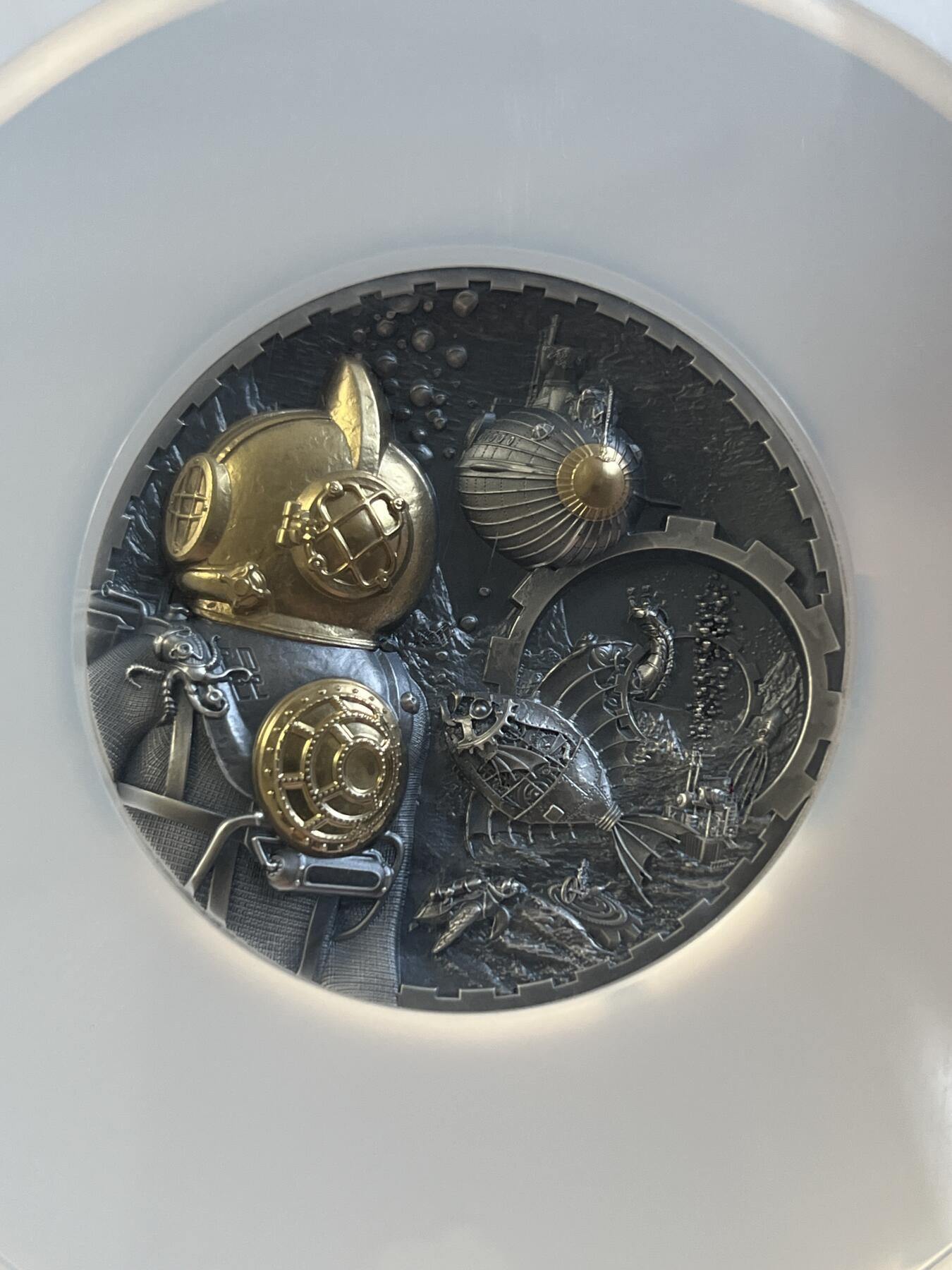 第177期拍卖【长期征集拍品】 NGC-PF70ULTRA CAMEO 库克2022年发行蒸汽朋克系列-鹦鹉螺浮雕镀金仿古纪念银币（超高浮雕效果震撼，3盎司克重，币径50MM，限量发行888枚，加厚大盒，拥有上天下海的能力一直是人类挑战未知世界的渴望，这枚里面寓意着人类挑战海洋成功！），无盒无证书